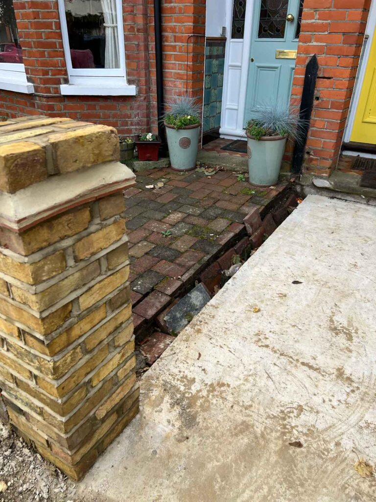 The process of laying a victorian path showing the site before