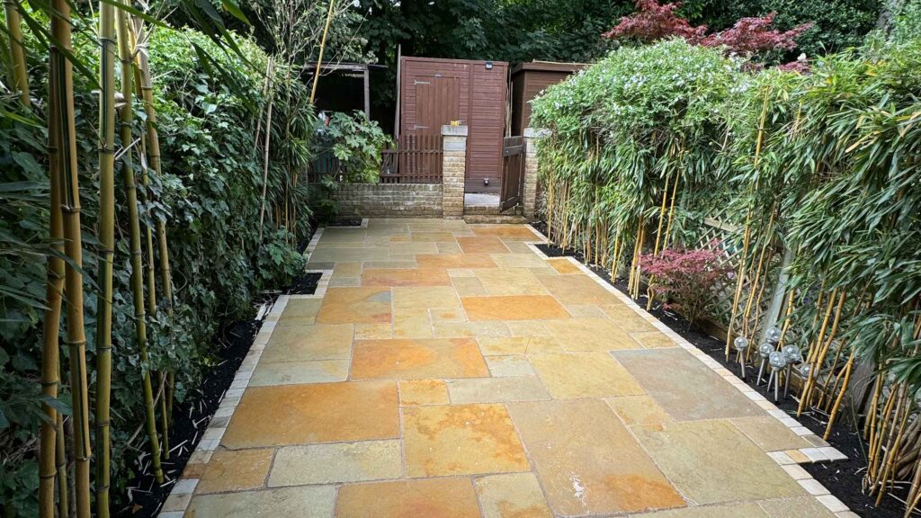 A new limestone patio in the project pack pattern. Beige and warm yellow colours.